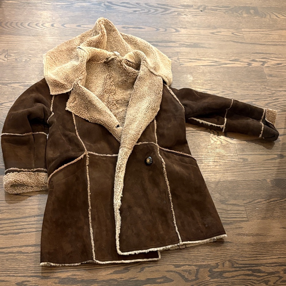 Brown Shearling Coat would compare to a s/m